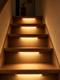 Pulse bars lighting staircase steps, motion-activated