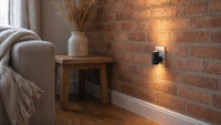 Same living room with Vesper plugged in: amber floor pool